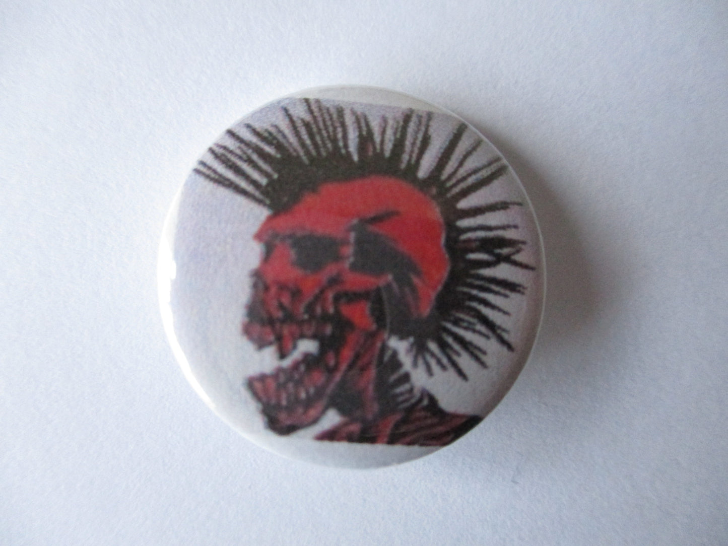 EXPLOITED punk badge (VARIOUS DESIGNS)