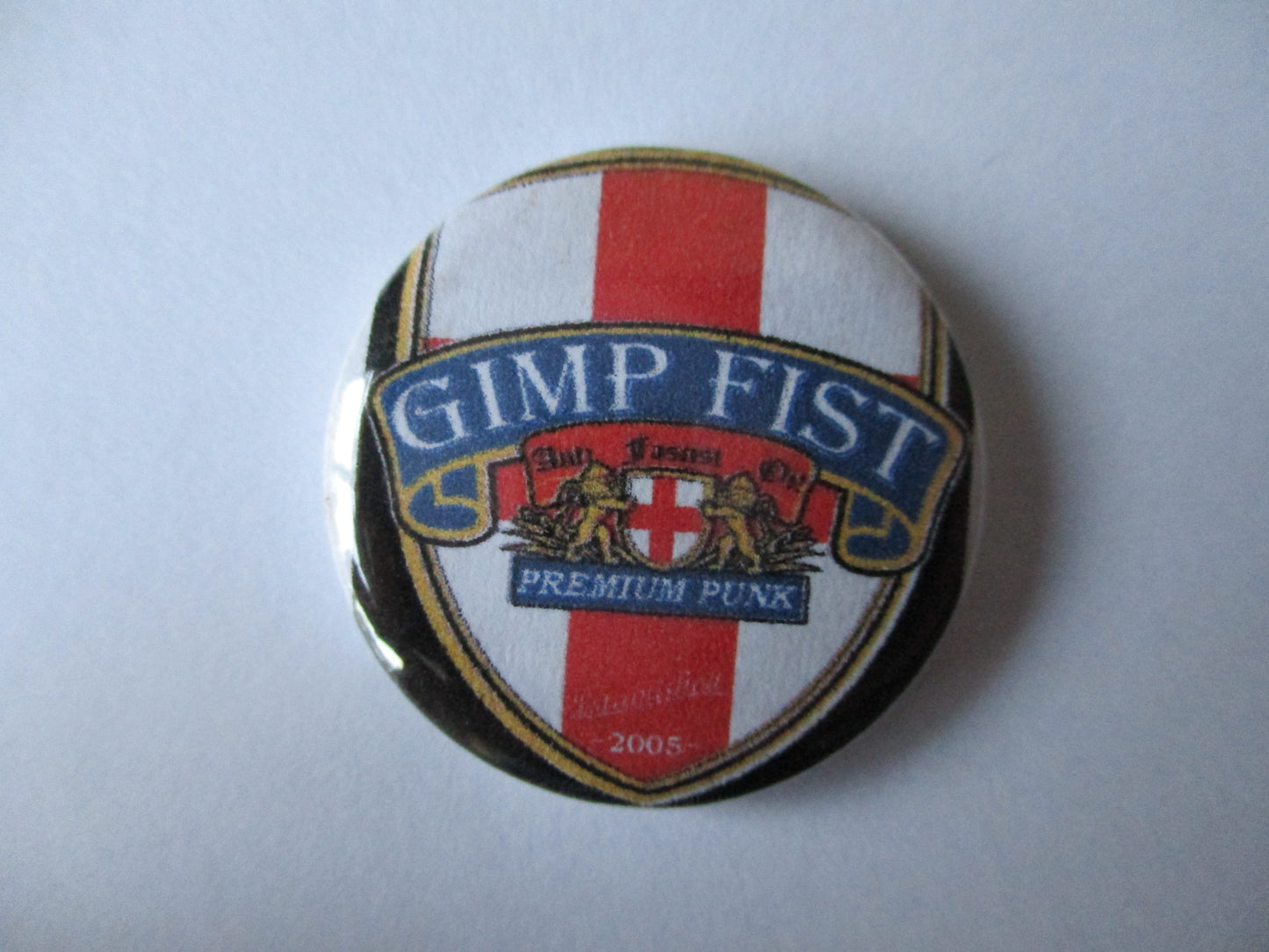 GIMP FIST punk badge (VARIOUS DESIGNS)