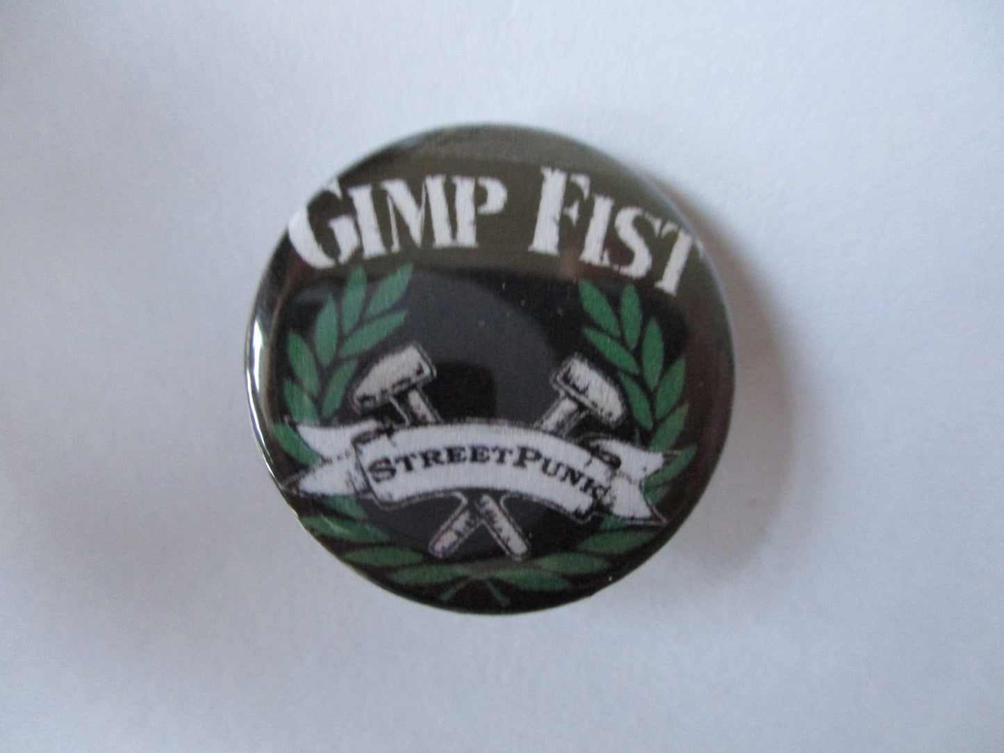 GIMP FIST punk badge (VARIOUS DESIGNS)