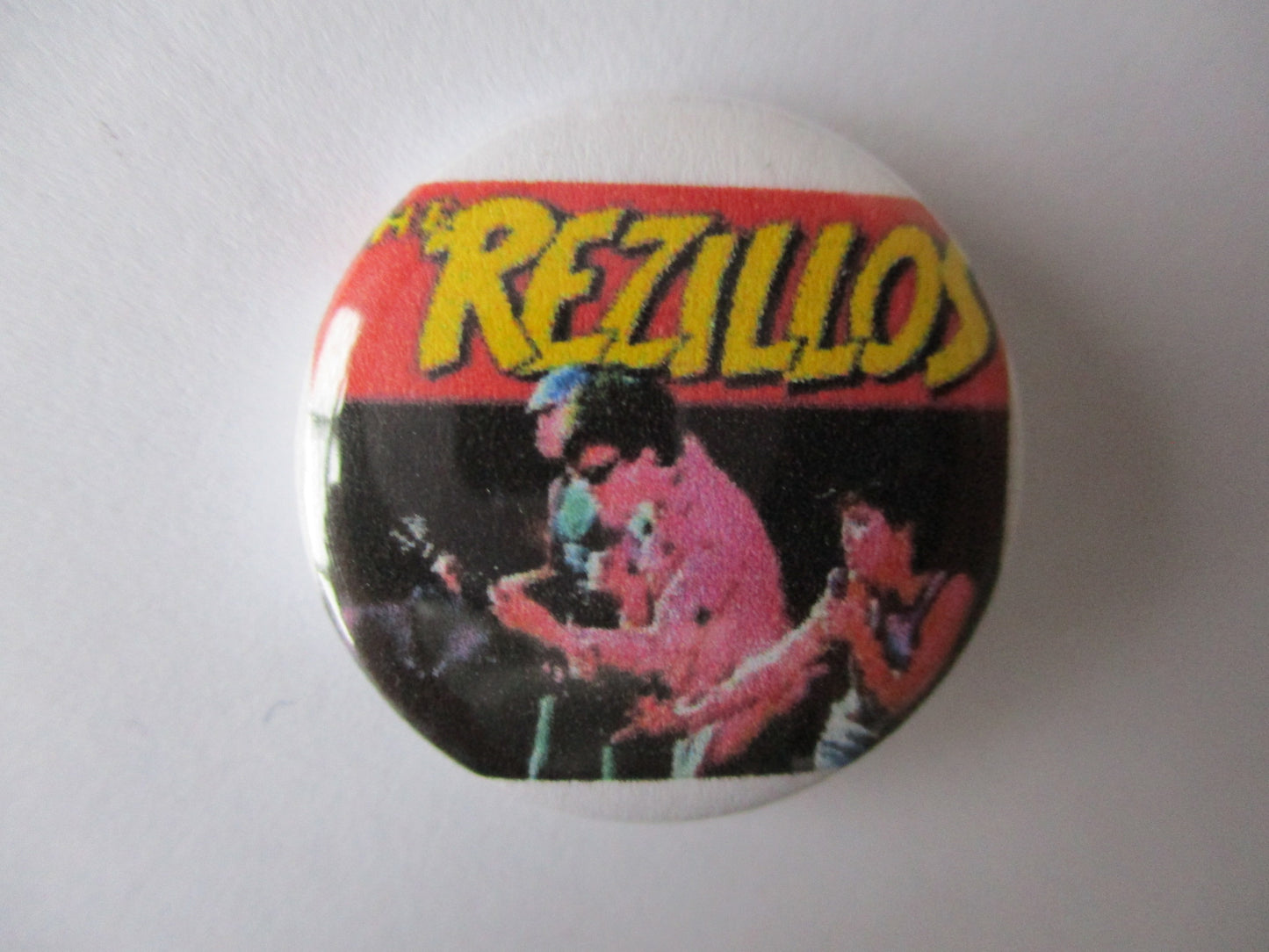 REZILLOS punk badge (VARIOUS DESIGNS)