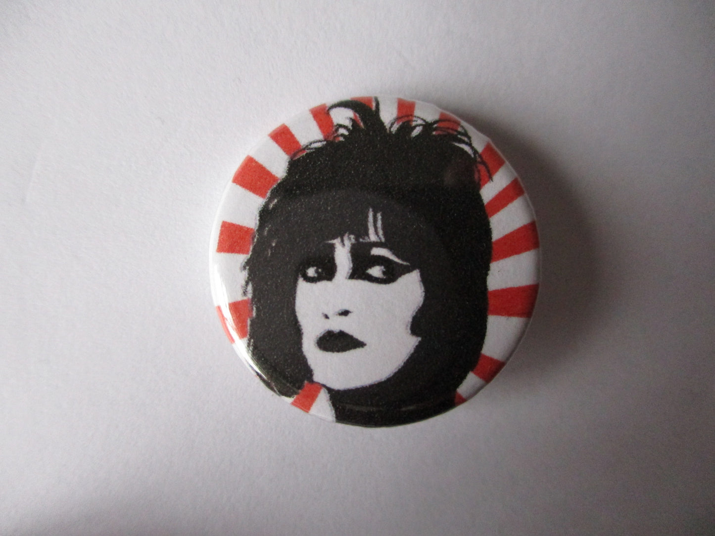 SIOUXSIE rising sun punk badge