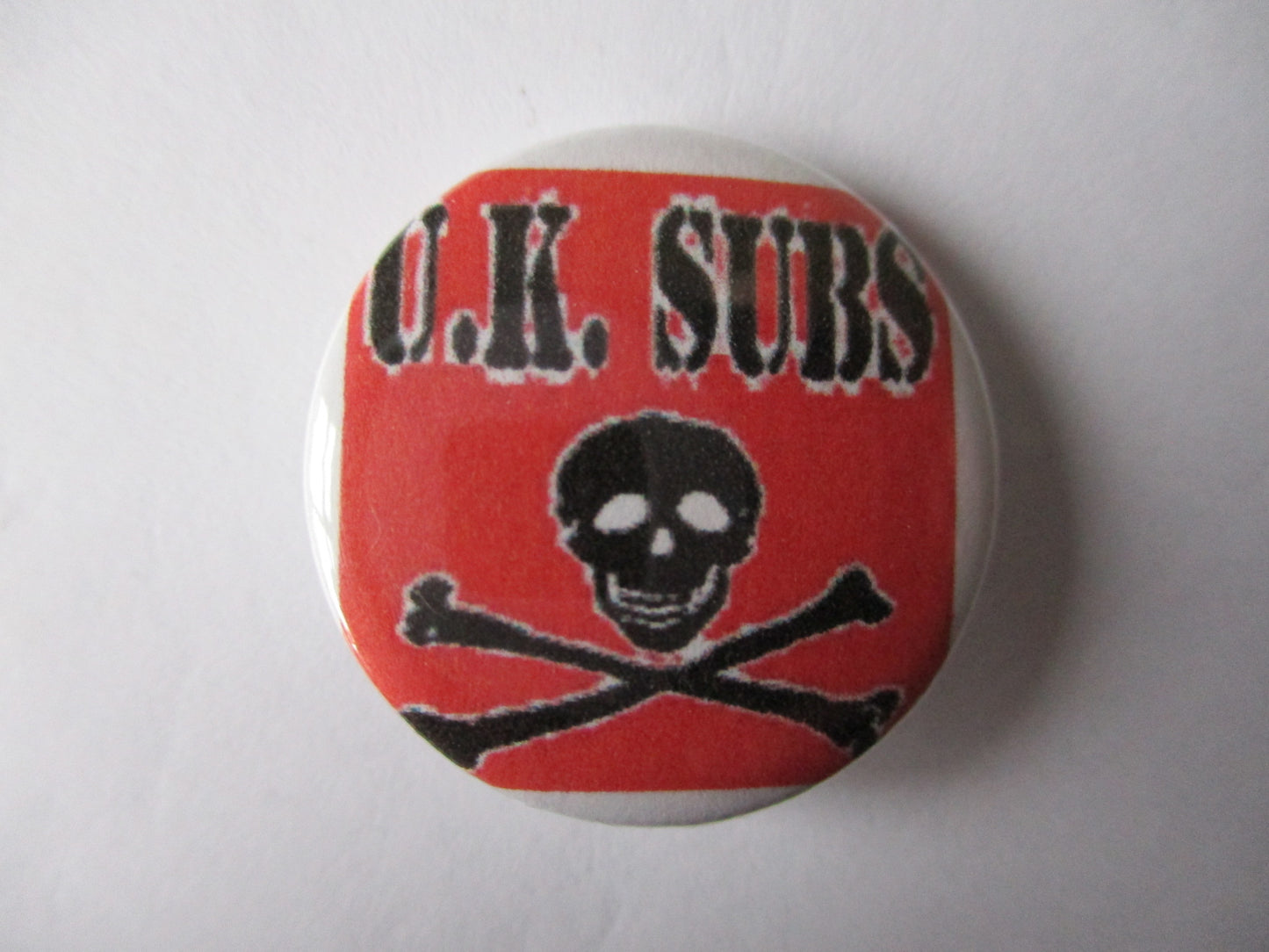 UK SUBS punk badge (various designs)