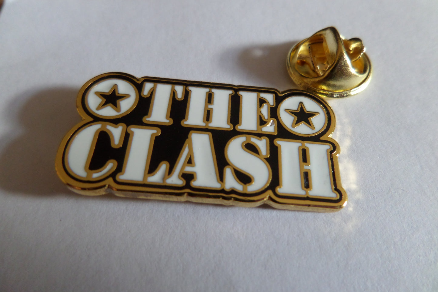 THE CLASH gold/b&w stencil logo PUNK METAL BADGE - Savage Amusement